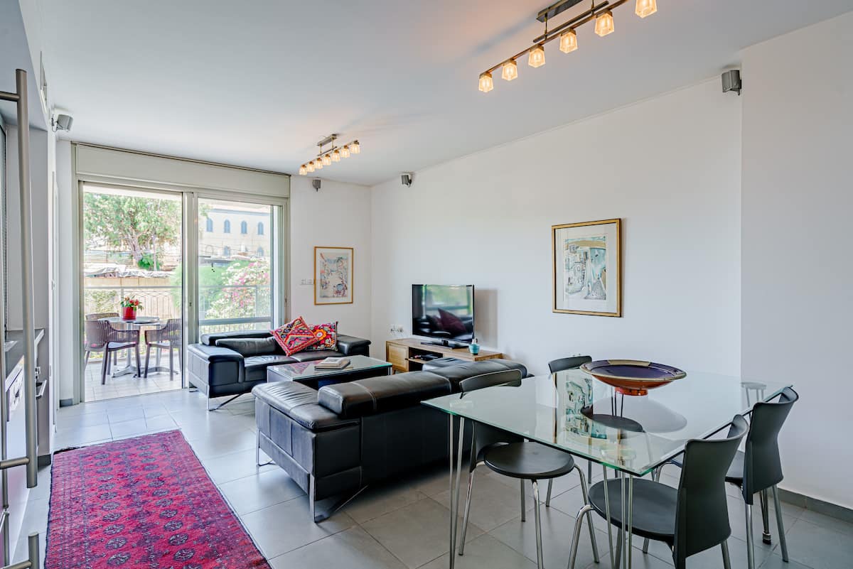 Harova Apartment Jaffa – living room with balcony view